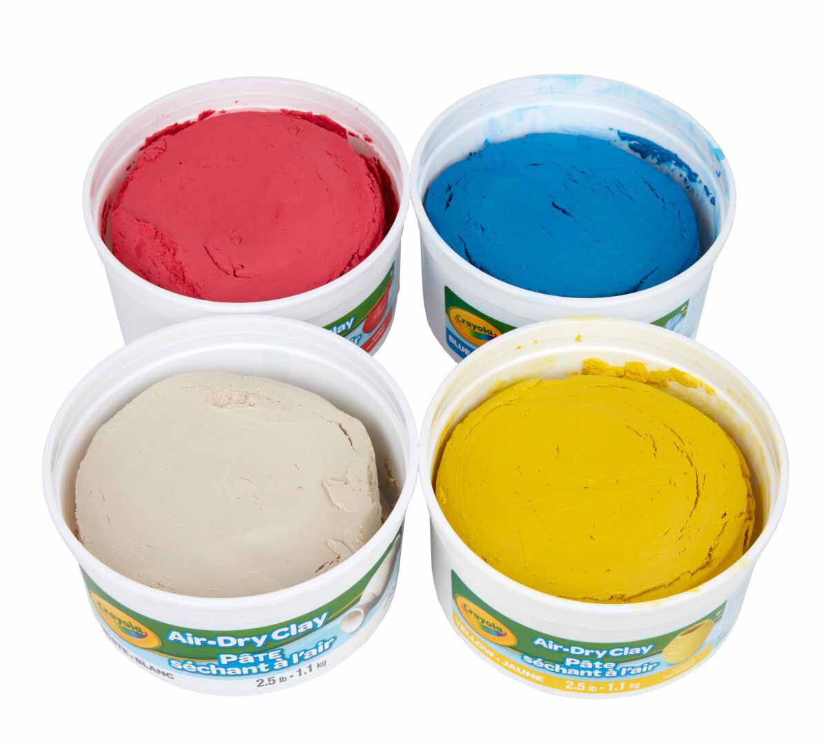 4-in-1 Air Dry Clay. (4) 2.5lb resealable buckets. classic colors. buckets with their tops off.