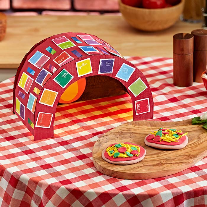 cardboard pizza over craft. Front view of pizza over craft